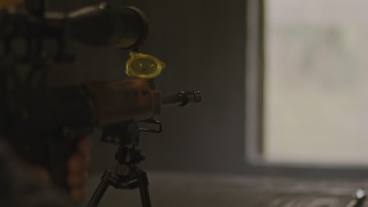 Close up of FN FAL combat rifle firing in slow motion