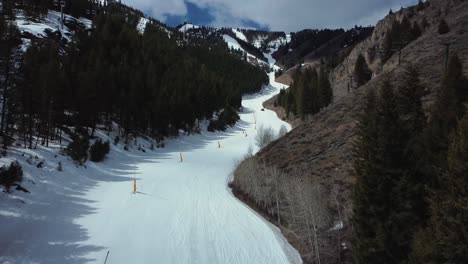 Aerial-View-Of-Piste-With-Markers-On-A-Mountain-During-Winter-In-Sun-Valley,-Idaho