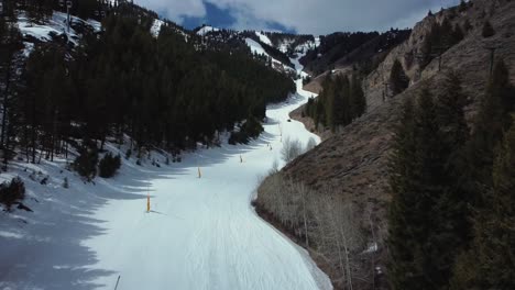 aerial view of piste with markers on a mountain during winter in sun valley, idaho