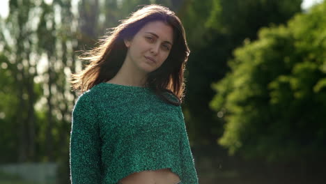 Gorgeous-Italian-fashion-model-posing-in-her-outfit-in-a-park-in-London-at-golden-hour