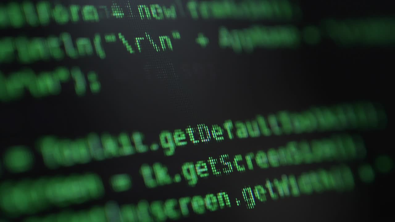 Hacking Concept. Green Running Commands on the Computer Screen