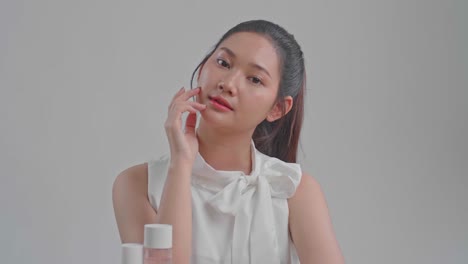 young woman posing for skincare advertisement