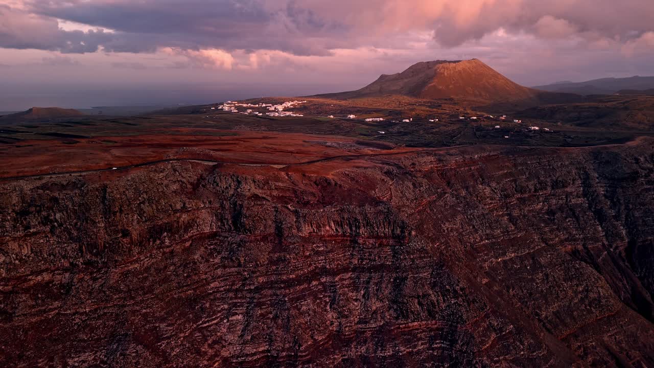 Breathtaking aerial drone footage captured at sunset from El Mirador del Río in Lanzarote, Canary Islands.