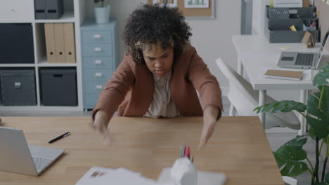 woman stressed in office