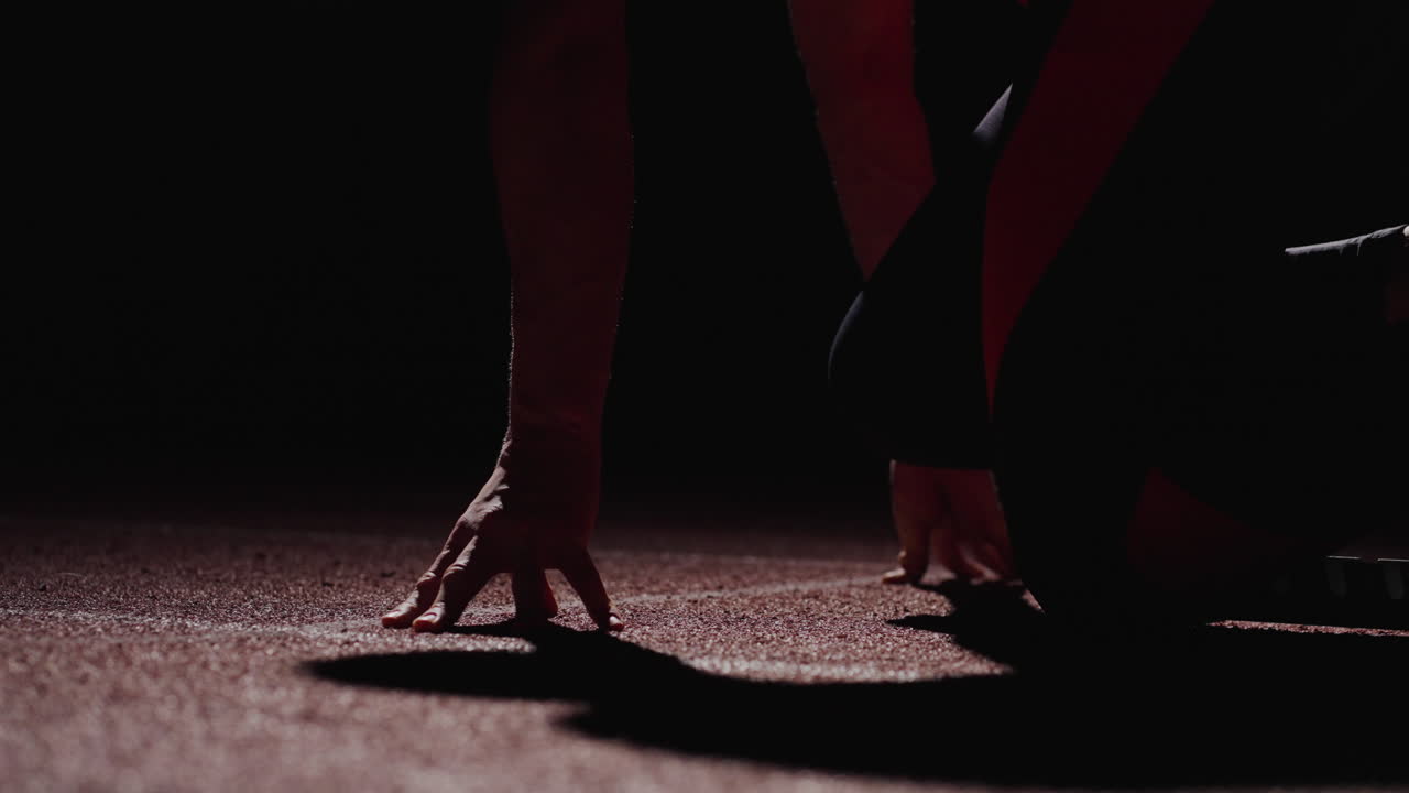 atleta en posición de salida para el sprint