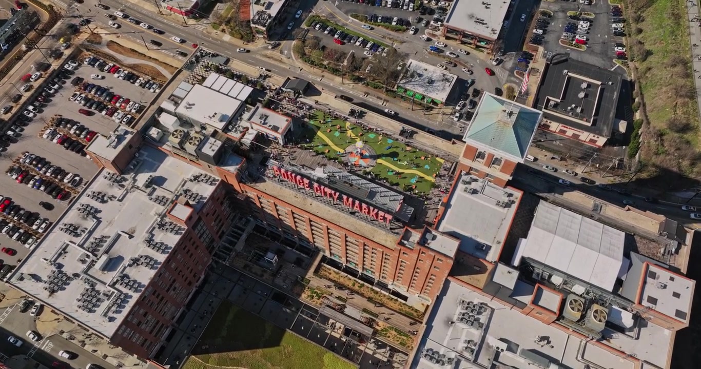 Atlanta Georgia Aerial v822 flyover O4W overlooking at Midtown cityscape, birds eye view capturing Ponce City Market, rooftop skyline park and constructions - Shot with Mavic 3 Cine - March 2022