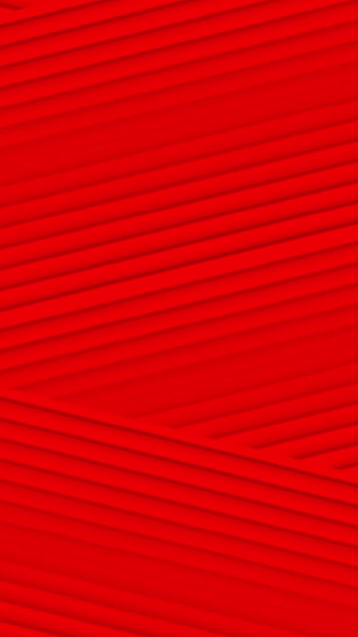 A radiant red background with a smooth flowing visual effect.