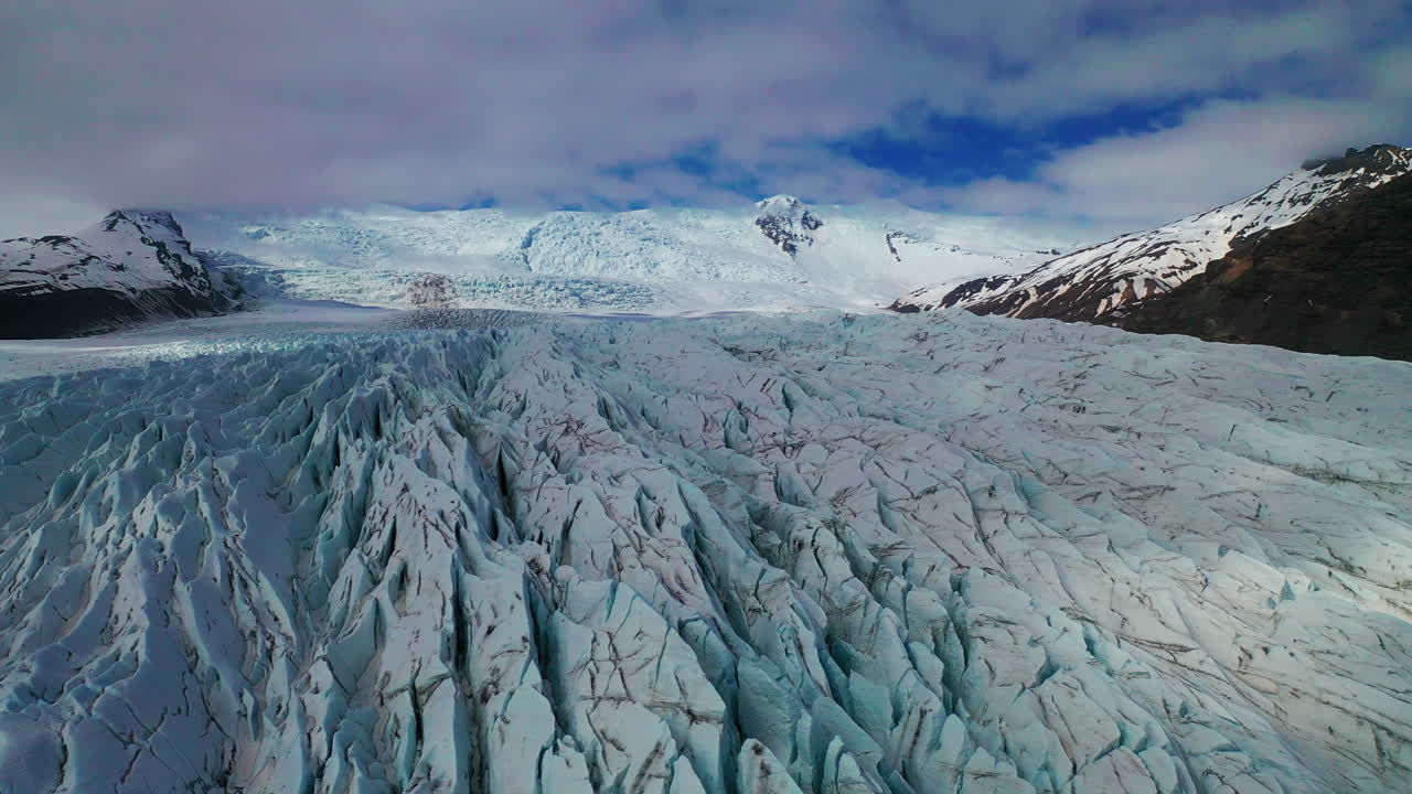 Ascending Over The Beautiful Deep Snow Terrain Of Falljokull In South Iceland - Drone Shot