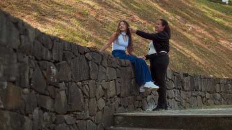 Mother and Daughter Bonding and Conversing in a Park