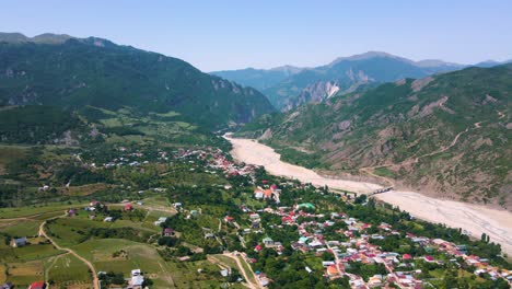 Drone-shot-flying-over-the-town-of-Lahic-in-the-Caucasus-mountains-in-Azerbaijan