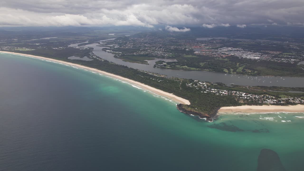 Panoramic View Over Fingal Headland With The Tweed River On a Cloudy Day In NSW, Australia - Drone Shot
