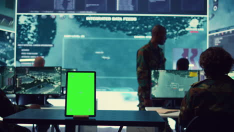 Isolated-greenscreen-display-running-on-a-tablet-in-military-power-base