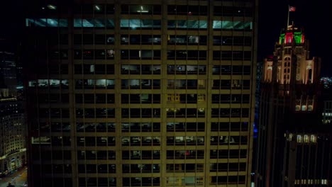 from river sliding after a office building revealing landscape of urban life from chicago