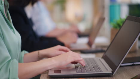 Close-Up-of-Hands-Typing-on-Laptop-Keyboard