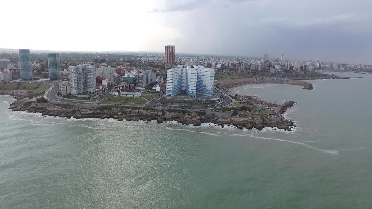 Aerial View of Coastal City with Beach and Ocean