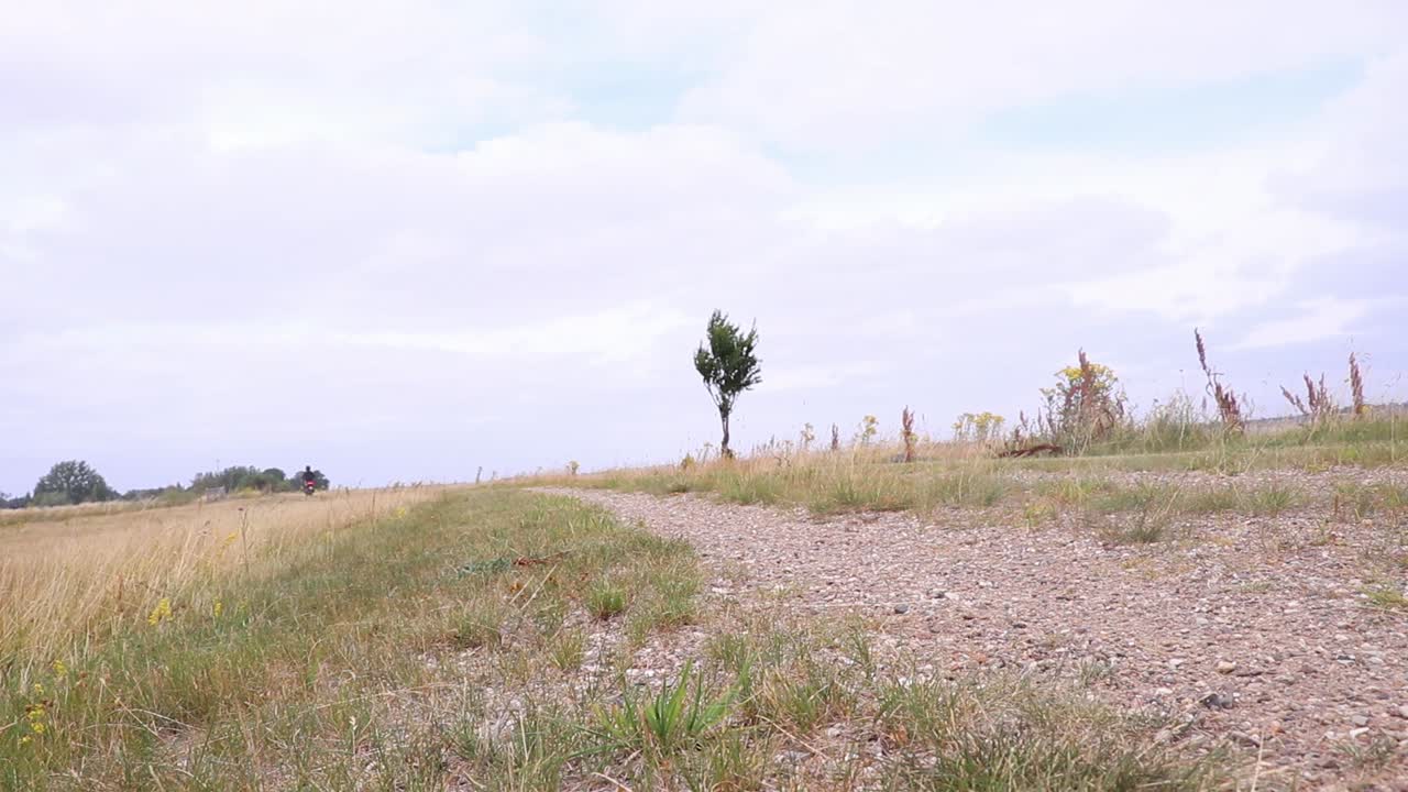 Moped scooter drive by camera.