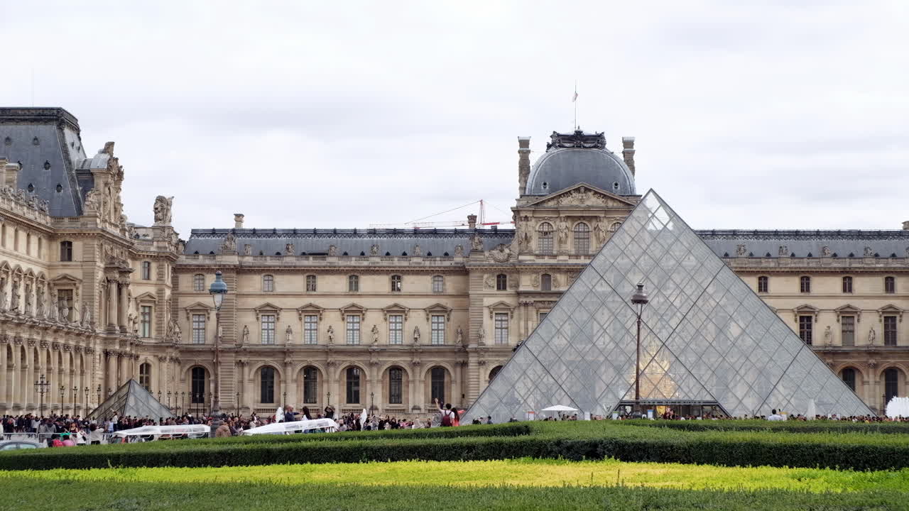 Paris, France - November 21, 2021: Front view of the Louvre Museum on a cloudy day