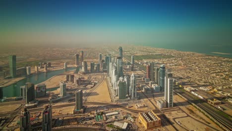 sunny day dubai city industrial part roof top panorama 4k time lapse united arab emirates