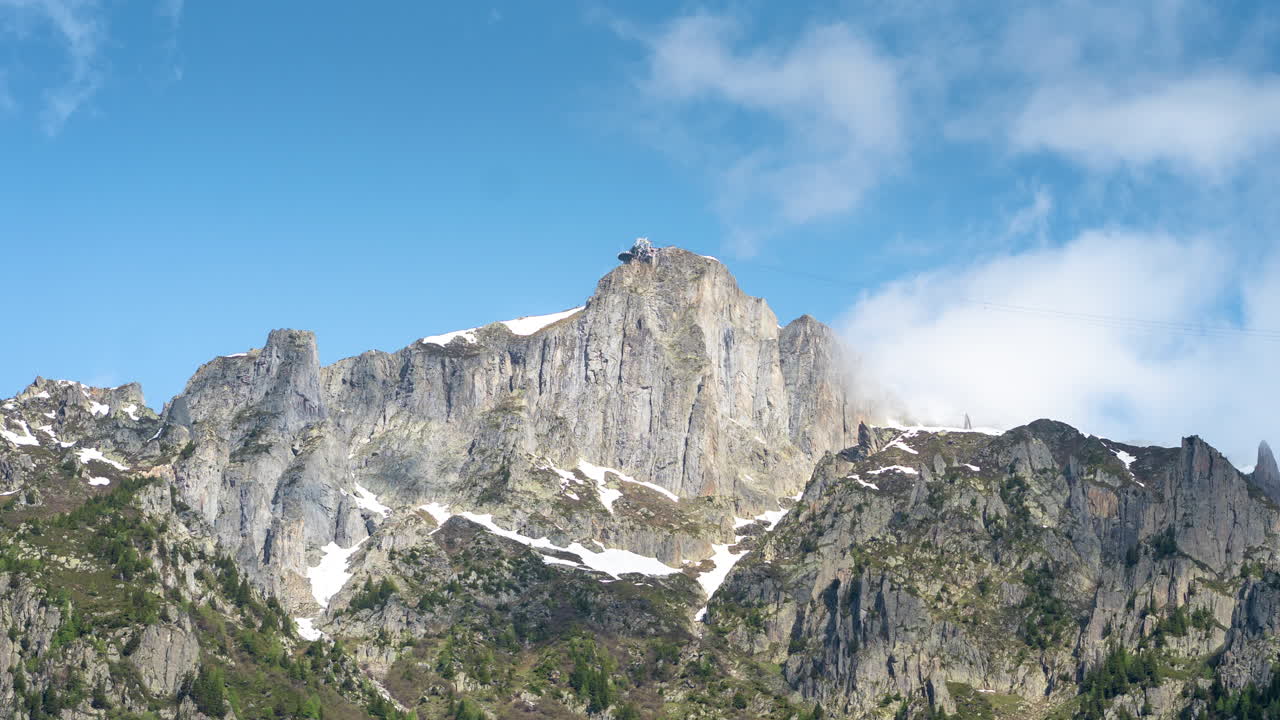 French Alps Timelapse. Clouds Above Mountain Peak on Sunny Winter Day, Chamonix France