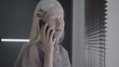blonde woman on phone