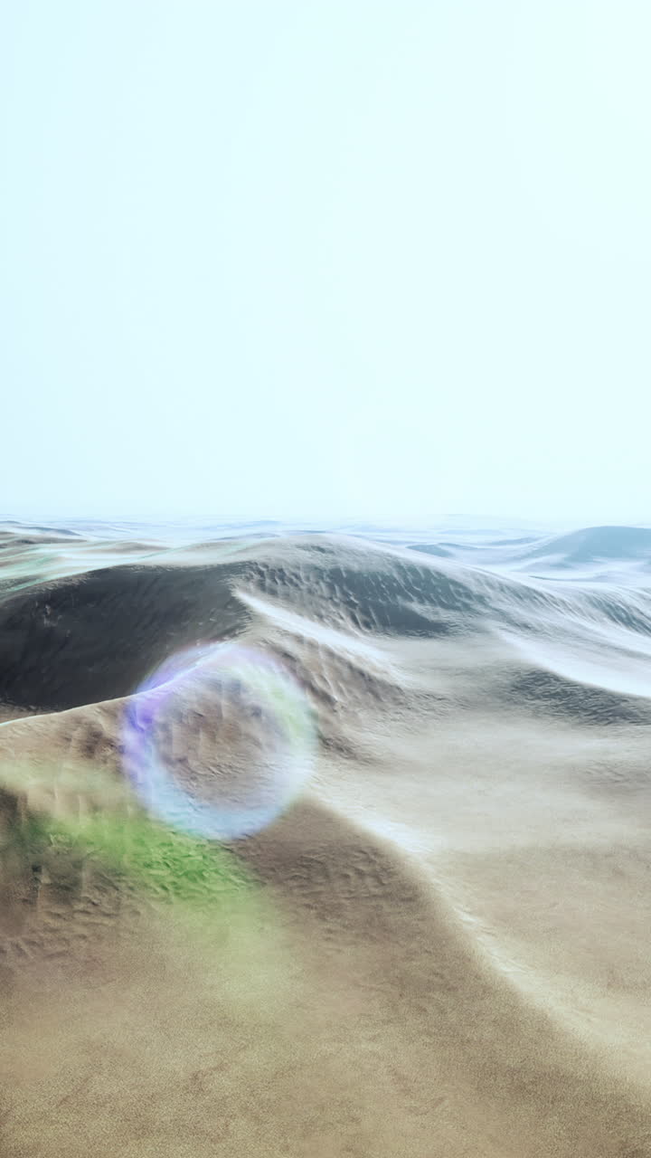 사막의 모래 언덕 위에 해가 지는 것