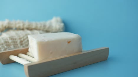 Homemade-natural-soap-bar-on-black-background