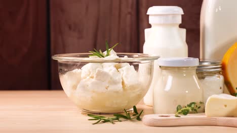 various dairy items displayed on wooden background