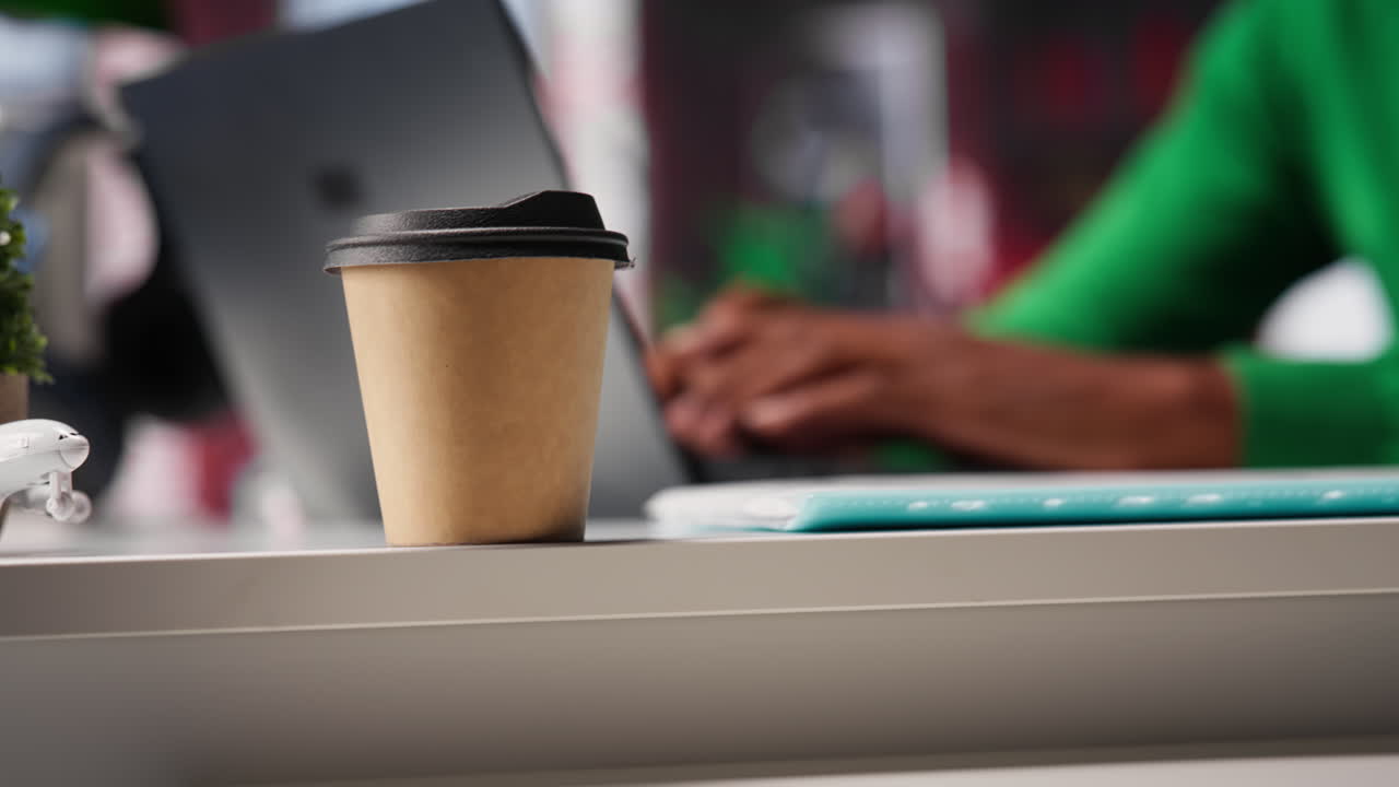 Vertical Video Male freelancer drinking coffee and solving his daily assignments at home