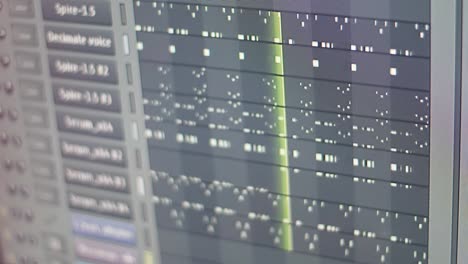 screen monitor of many track during playback of digital daw with playback head is moving