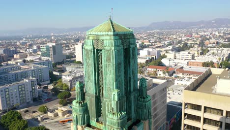 good aerial of the bullocks wilshire art deco historical building and copper summit in los angeles california