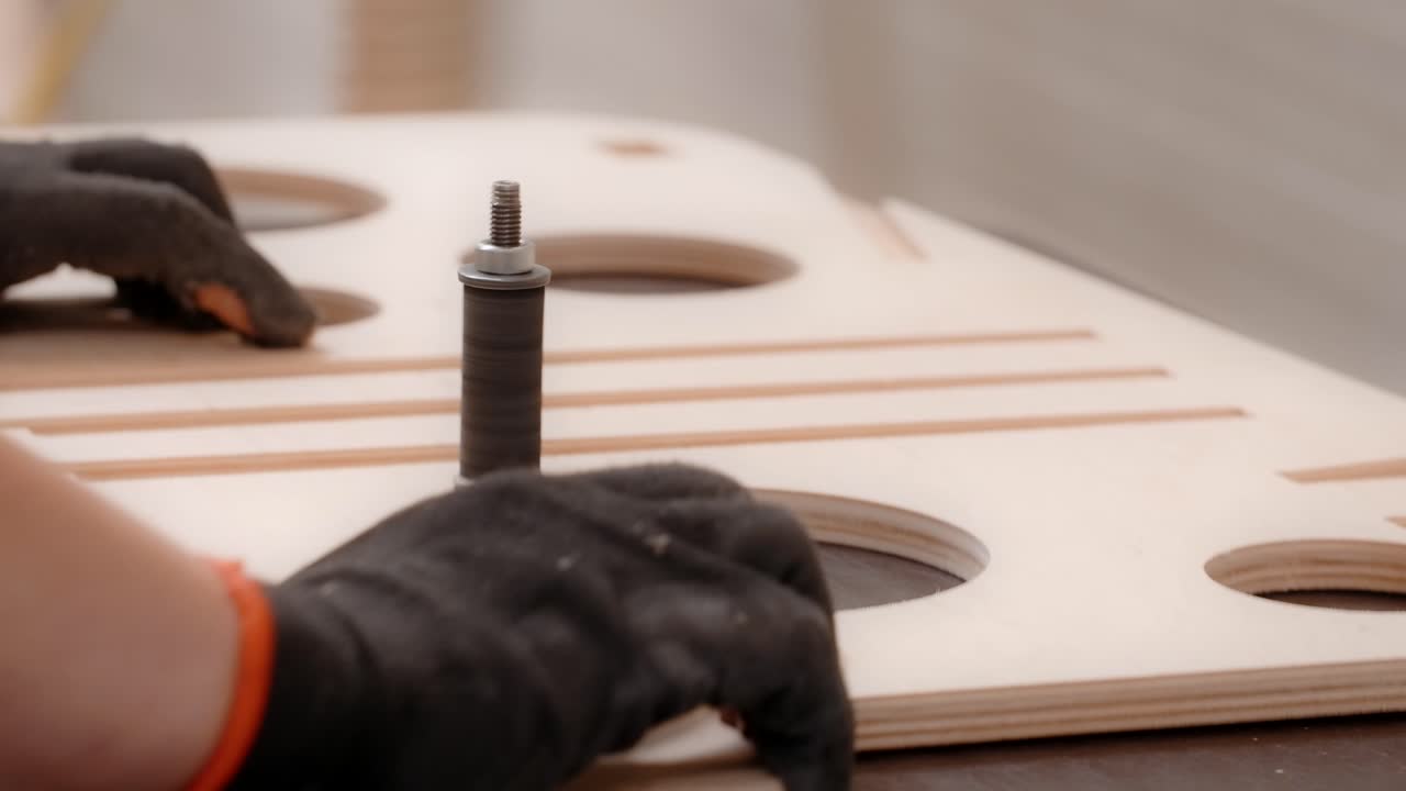 Woodworking Process: Detail of work on a wood panel