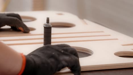 woodworking process: detail of work on a wood panel