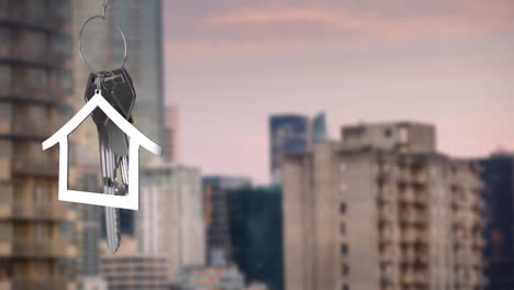 animation of silver house key and jey fob over cityscape