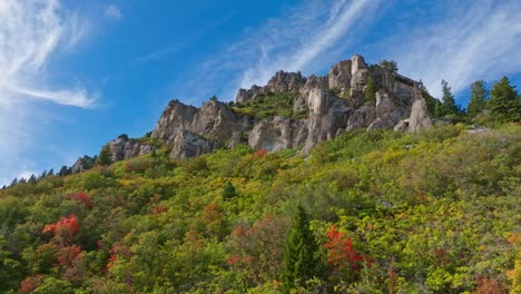 Flying-over-the-Wasatch-Mountains-in-Ogden-Canyon-with-beautiful-sky-and-foliage