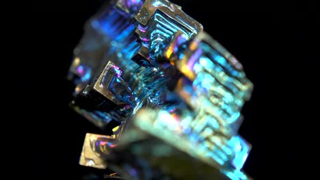 seamlessly rotating a colorful mineral (bismuth) in front of black background