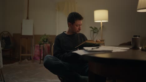 man reading in a home studio