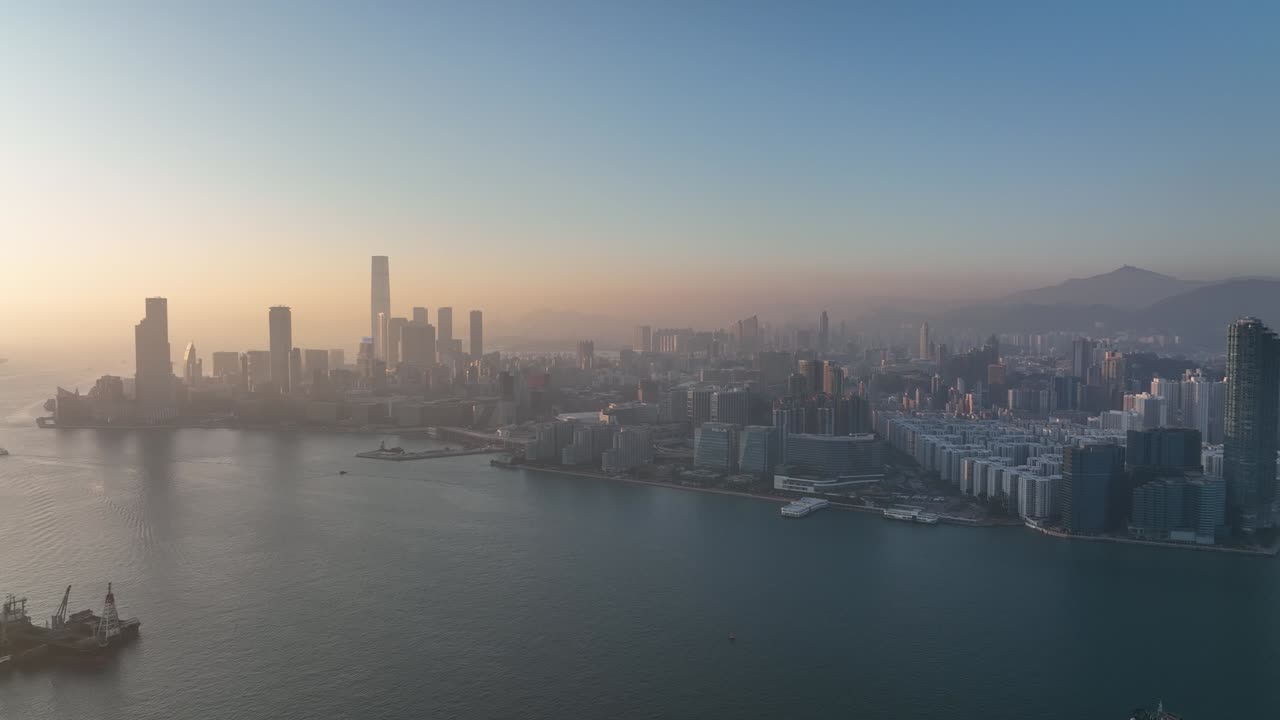 imágenes aéreas en 4k de la ciudad de hong kong al atardecer
