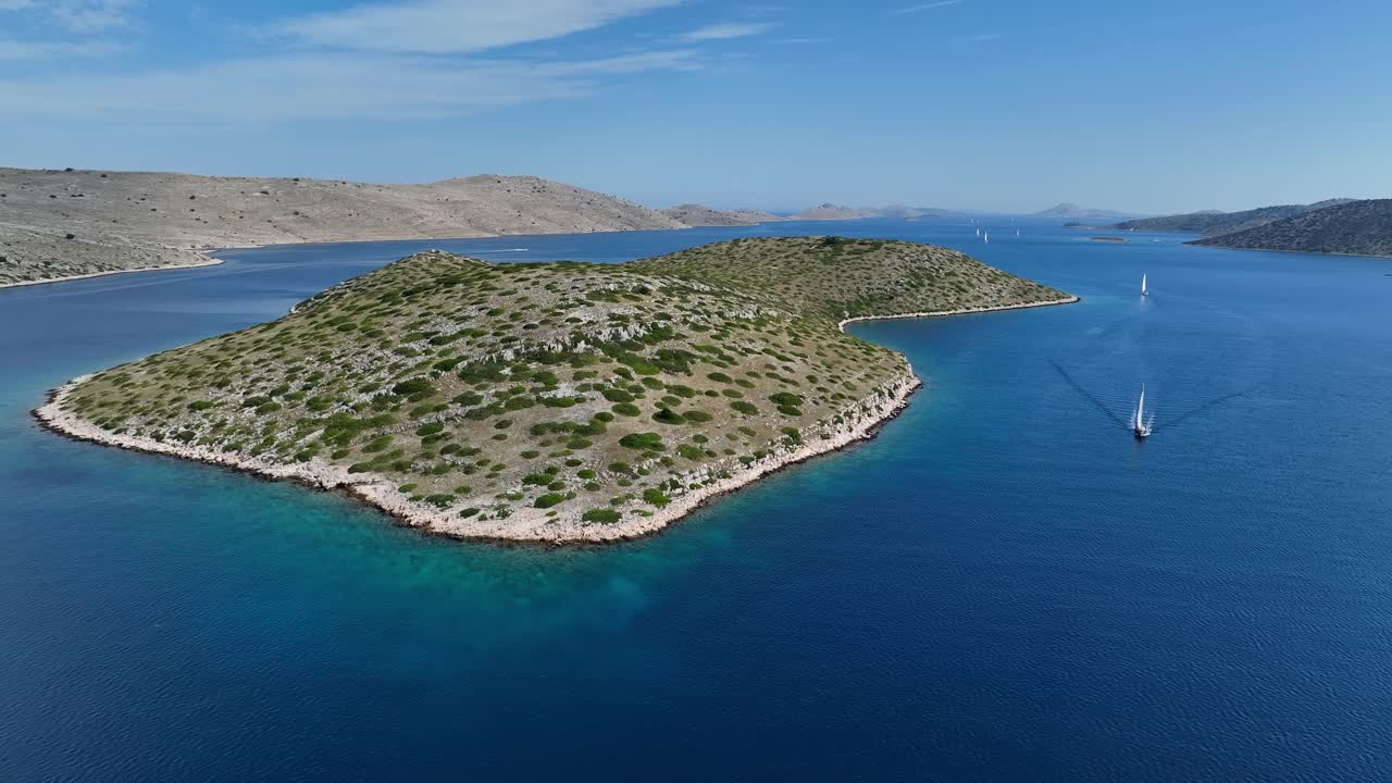 Orbit over small island in Kornati region on a sunny day - Croatia.