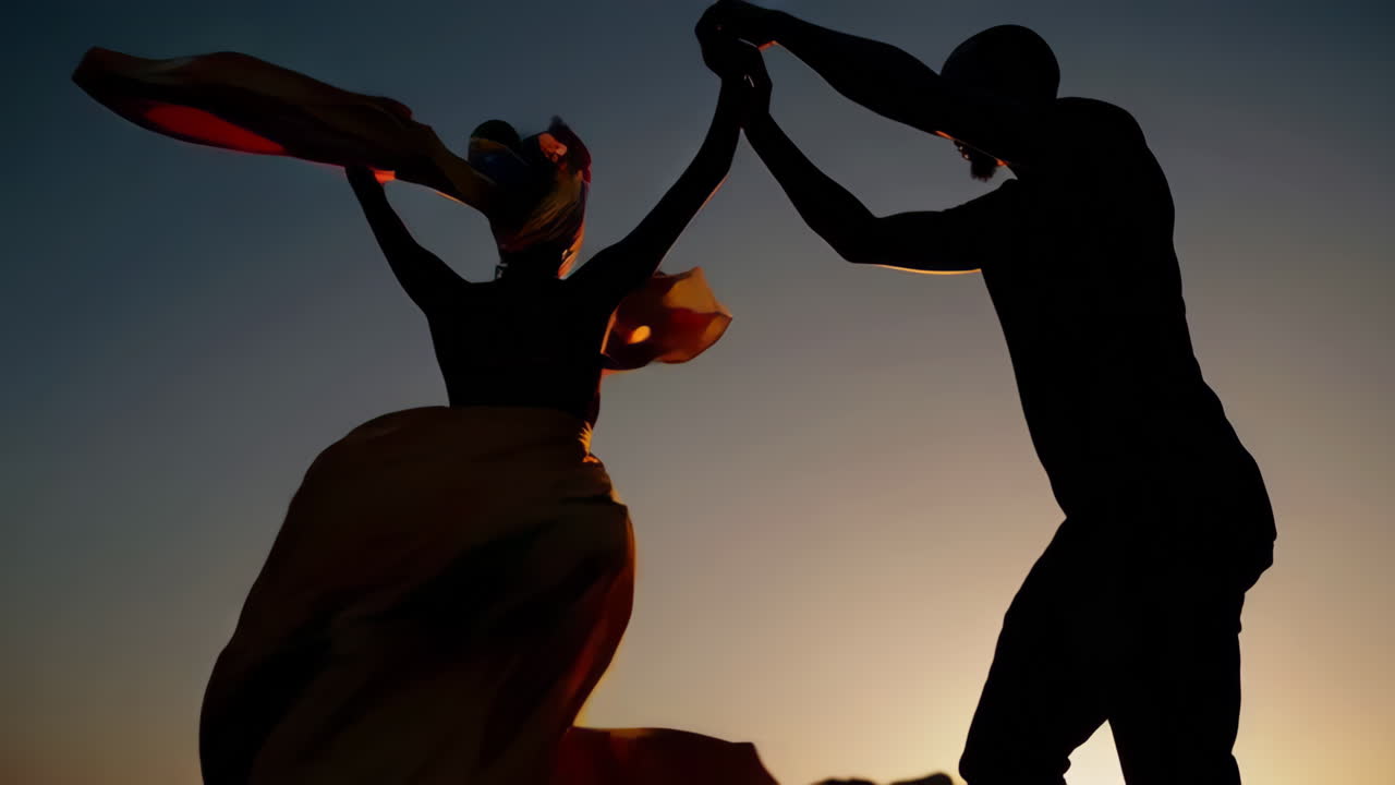 Silhouette Dance at Sunset