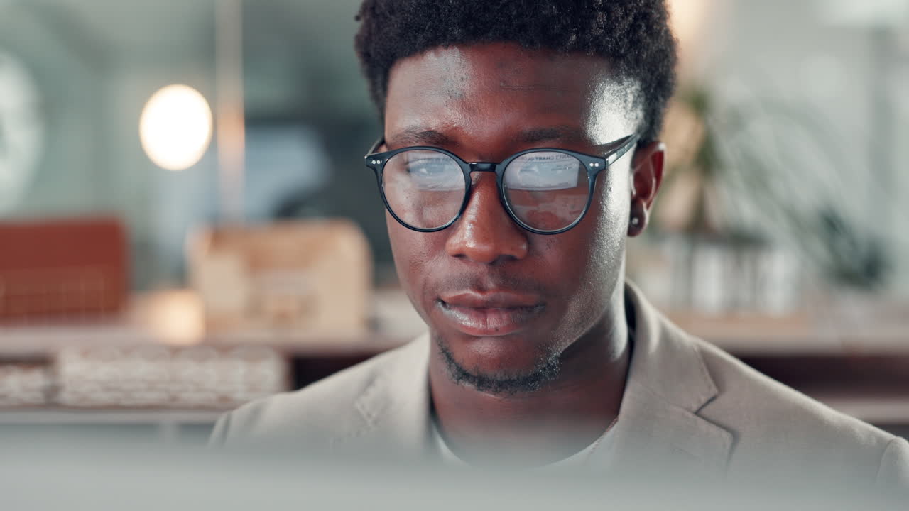 Man wearing glasses in office