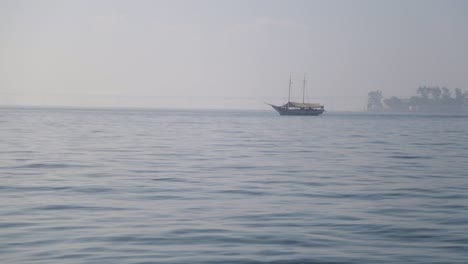 boat at baia de guanabara, view from praca maua, in rio de janeiro, brazil