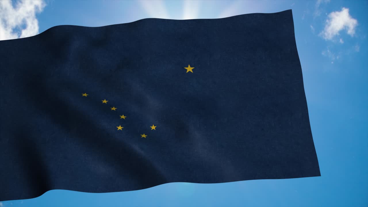 알래스카의 발이 바람에 흔들리고, 푸른 하늘의 배경.