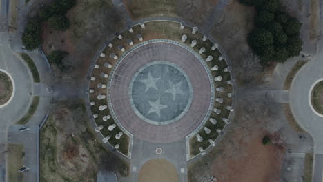 Rising straight down aerial over Tri-Star Tennessee state emblem, 4K