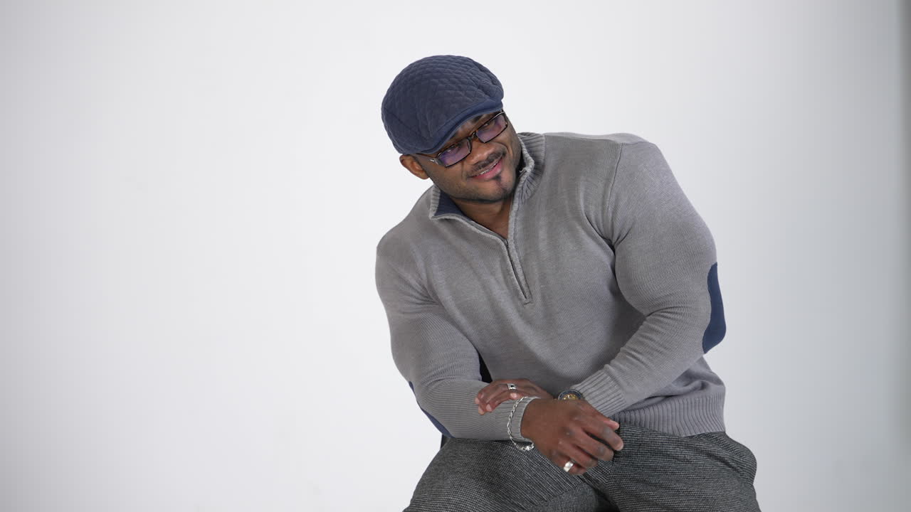 African man against grey background. Portrait of young african man over grey background