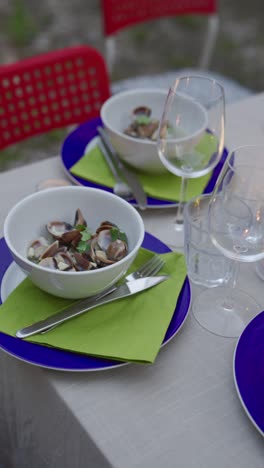 outdoor dinner party with clams