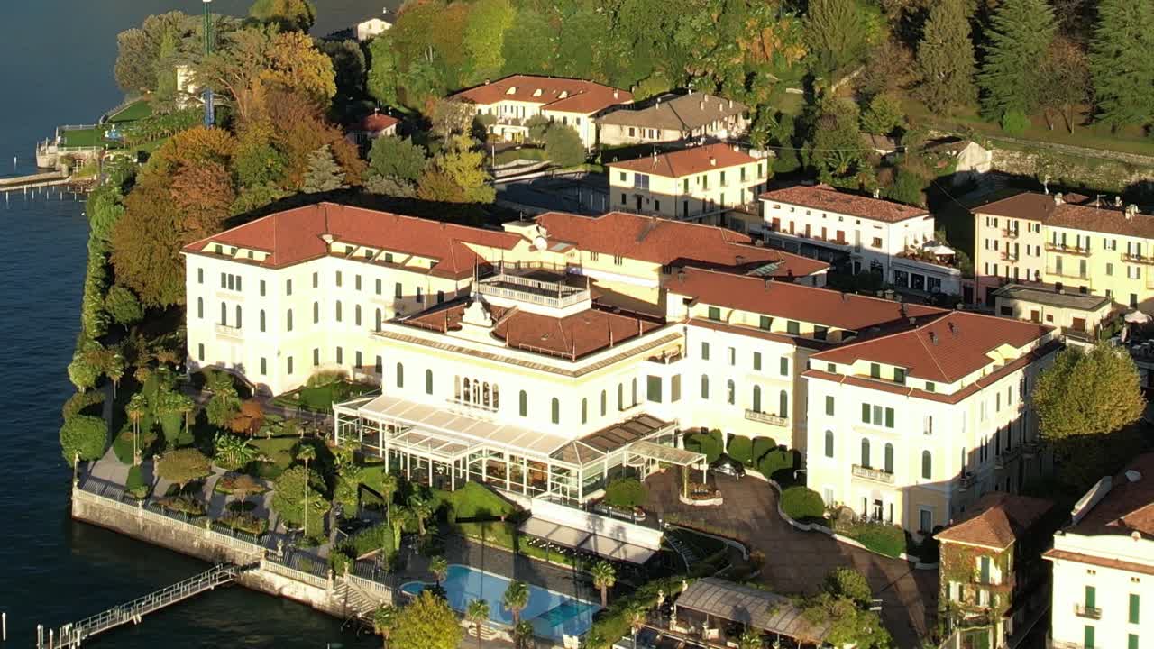 Beautiful aerial view of a lakeside hotel in the Alps, Italy