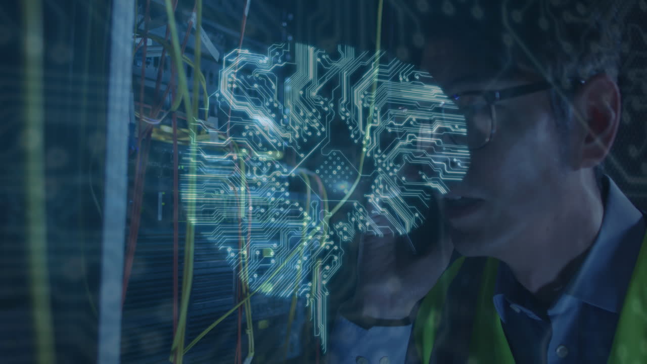 Animation of computer circuit board and digital brain over asian man in server room