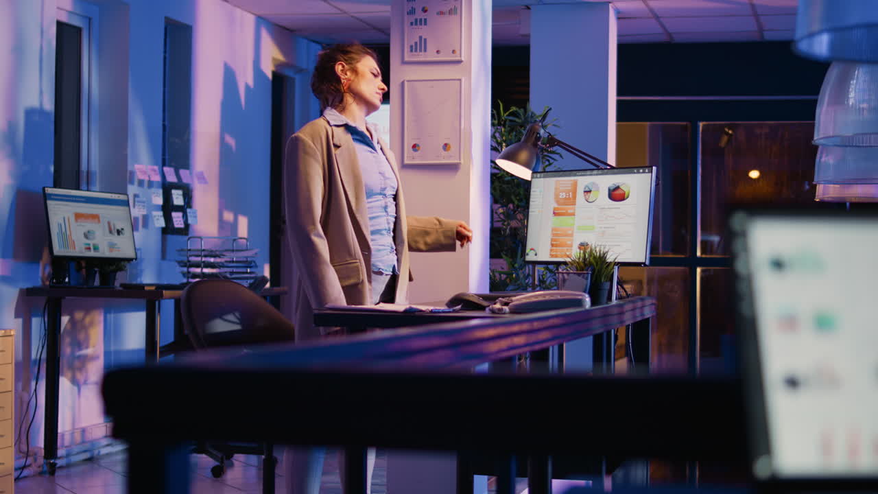 Woman working in an office with computers