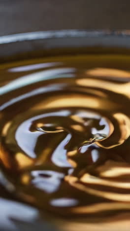 golden liquid swirls