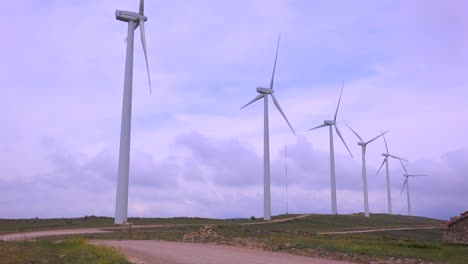 windmills generate electricity in the hills of spain 1